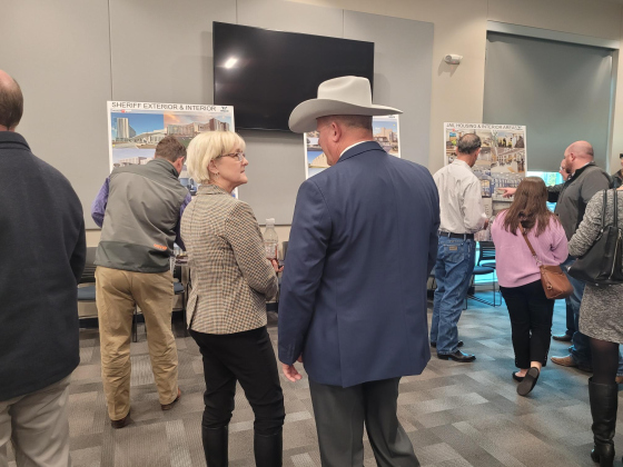 County Commissioners Valerie Covey, left, and County Sheriff Matt Lindamann, right, participate in the January 15 Justice Complex Project open house at the EMS North Campus. Photo by Nalani Nuylan. 