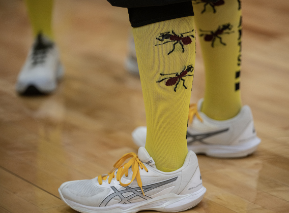 Members of the Granny Basketball Team, the Texas Fire Ants, wore their custom-designed socks during a matchup against members of the Georgetown Police Department  held at East View High School on Saturday, January 17, 2026.  The game, won by the Fire Ants, with a final score of 55-47,  benefits the Carver Center for Families.      Photo by Andy Sharp.