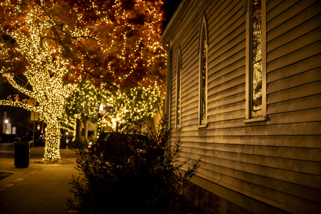 Holiday lights fall on the facade of the Grace Heritage Center  on Tuesday, December 16, 2025.  Seasonal lights are abundant in Downtown Georgetown this year.  Photo by Andy Sharp.