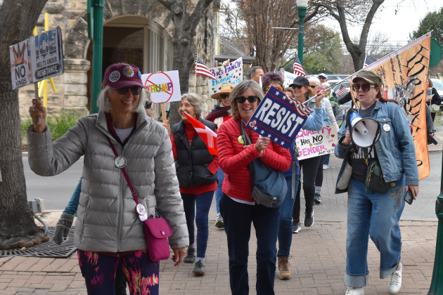 During the national Walk out for Freedom on Tuesday, January 20, Williamson County residents took part by protesting Immigration Customs Enforcement, President Donald Trump and his recent talk of making Greenland the next U.S. state. Protestors walked around the Williamson County Courthouse and the Square in downtown Georgetown. (Photo by Kaitlyn Wilkes)