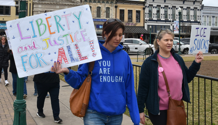 Some protestors held more generally patriotic signs that said things like “liberty and justice for all” in order to show their support for the protest that took place on January 20 in downtown Georgetown. (Photo by Kaitlyn Wilkes)