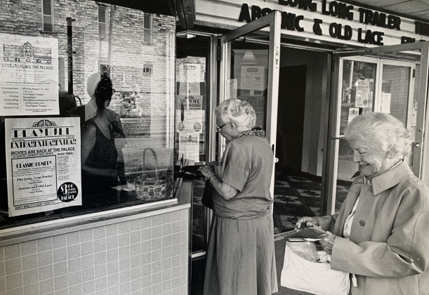In this 1991 photo, Raye McMcoy prepares to enter the Palace with her friend Mary Forbes, who was purchasing tickets to the “Long Long Trailer” movie. The Palace started showing movies again that afternoon, after a two-year hiatus. The patrons said they had been coming to the Palace to see movies for more than 40 years. (Sun Archive)