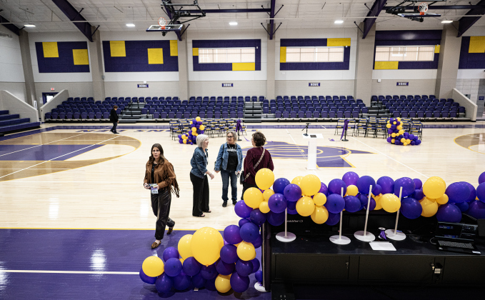 Visitors explore the gymnasium in the new Granger Secondary School during an open house on Wednesday, February 25, 2026.