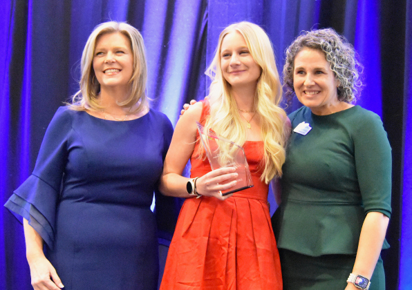 Emma Hilton, center, from Farmers Insurance, won Ambassador of the Year at the annual Georgetown Chamber of Commerce awards on January 30. Ms. Hilton is joined by chamber president Shontel Mays, left, and Cheryl Brinkmeyer, director of programs and events.