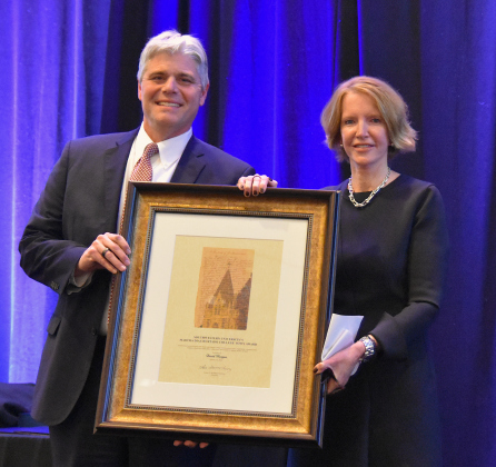 Georgetown City Manager David Morgan, left, is joined by Southwestern University president Laura Skandera Trombley, who awarded Mr. Morgan the Martha Diaz Hurtado College Town Award for his efforts in the Southwestern 560 plan.