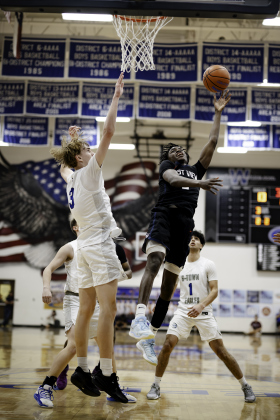 East View’s Cameron Sanford jumps up for a layup near the basket. He had 19 points in the game. 