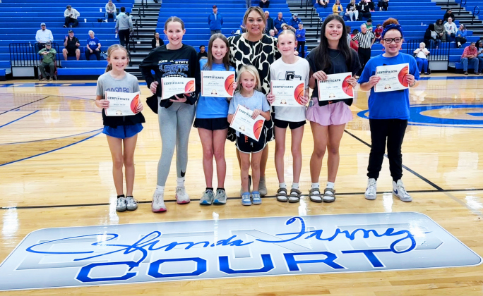 This year’s GHS Gym Rat Challenge finishers included from left to right: Mollie Miller, McKinley Kincheloe, Ally Miller, Landree Miller, Pyper Hill, Lydia Garcia, Ainsley Covington,standing with Varsity Coach Nicole Zavala. Not pictured is Olivia Dee.