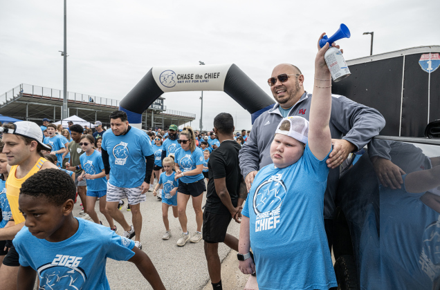 San Gabriel Elementary School student Scout Schulz, 9, right, with her dad, Richarte principal Bretton Schulz, was an official race starter, sounding the loud air horn  for the Fun Run during the annual Chase The Chief races held at East View High School on Sunday, March 8, 2026.