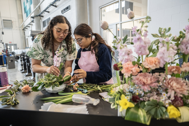 Floral design instructor Renae Bowie, left, works on an arrangement with East View High School student Guadalupe Hernandez  at the Georgetown ISD State of the District gathering held at the Future Ready Complex on Friday, March 6, 2026.