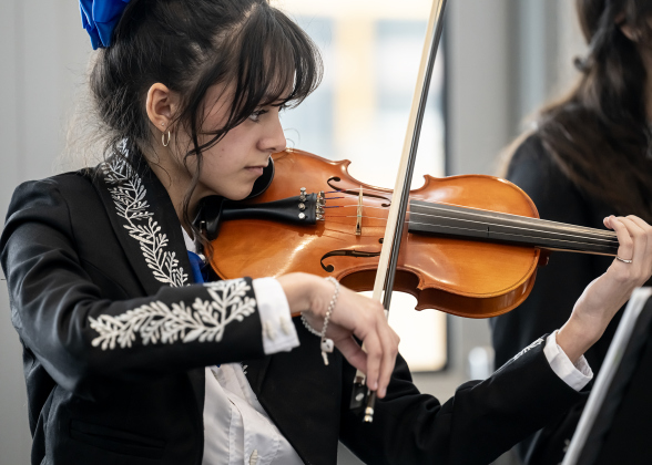 Georgetown High School mariachi band violinist Arihanni Poole, a sophomore, performs with her group at the Georgetown ISD State of the District gathering held at the Future Ready Complex on Friday, March 6, 2026.