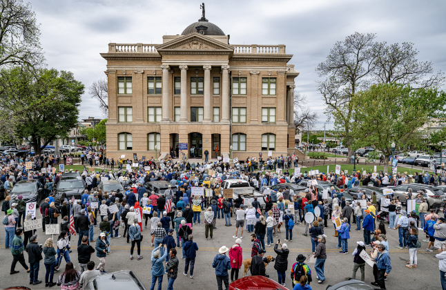 Crowds started to stretch onto Main Street (closed to traffic) at the No Kings rally held in downtown Georgetown on Saturday, March 28, 2026.  Approximately 700 people attended the rally, a demonstration opposed to the current Presidential administration of Donald Trump.  Photo by  Andy Sharp.