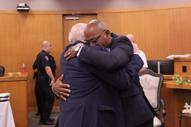 Stephen “Steve” Miller (right) hugs long-time friend, former Judge  Billy Ray Stubblefield (left) during Mr. Miller’s retirement celebration after 30 years of service on February 27 at the 26th District Court in Williamson County. Judge Stubblefield later described Mr. Miller as a brother in his farewell speech.