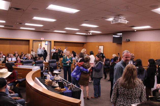 Friends, family and coworkers form the Justice and Sheriff's departments pack the 26th District Court to celebrate Mr. Miller's retirement.