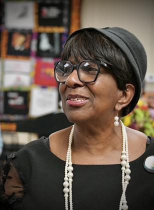 Paulette Taylor speaks to attendees during the Paulette Taylor Legacy Room dedication on February 27 at the Carver Center for Families. (Photo courtesy David Valdez)
