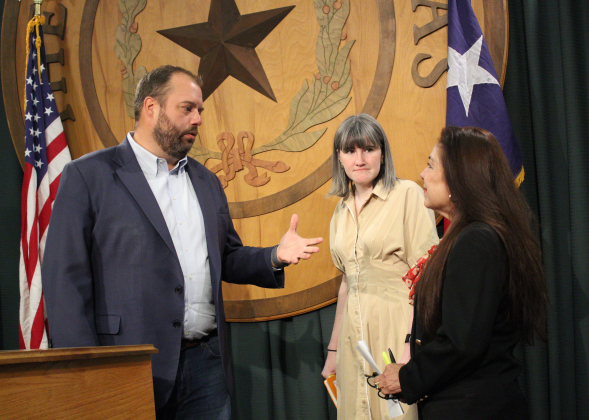 Representative Busy talks with Emily Eby French (center) of Common Cause Texas and Gloria Leal (right) of League of United Latin American Citizens after the press conference. Photo by Nalani Nuylan.