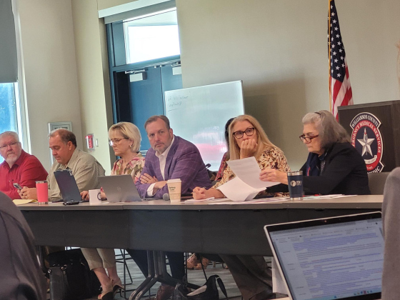 County Judge Steve Snell (center), is joined by the county commissioners Russ Boles of Precinct 4, far left, Valerie Covey of Precinct 3, center left, Cynthia Long, center right, and Terry Cook, far right) as they listen to the county department heads’ needs for the upcoming budget during a workshop on Friday, April 10. Photo by Nalani Nuylan.
