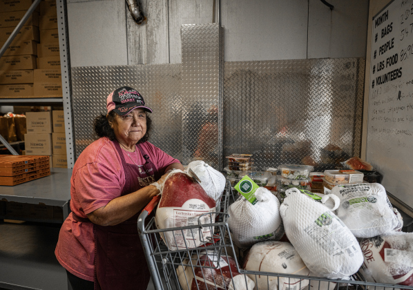 Victoria Guiterrez prepares turkeys for delivery at  Shepherd’s Heart Food Pantry  on Saturday, March 28, 2026.  Shepherd’s Heart Food Pantry and Thrift Shop, at 121 East 2nd Street, was founded by Executive Director Loretta Masters in 1994.  The group distributes food several times a week.  In 2025 Shepherd’s Heart averaged 2,110 distributions a month.    Photo by  Andy Sharp.