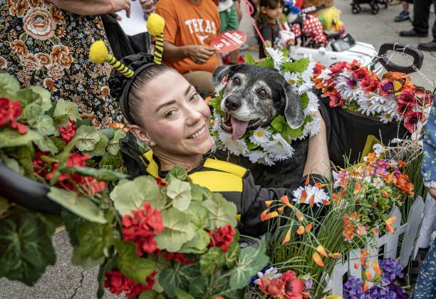 Victoria Bergdahl is pictured with Daisey, participants  in the Red Poppy Festival POPP Pup Parade and costume contest on Sunday, April 26, 2026.    Photo by  Andy Sharp.