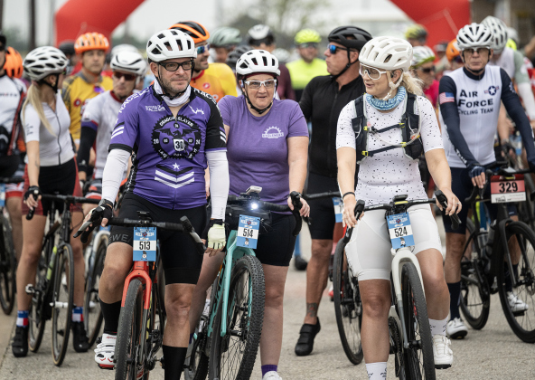 Cyclists (front, left to right) Dan Archer, his wife Mary Jo Archer and Melissa Barnett are ready to go at  this year’s Red Poppy Bike Ride, starting and finishing in the parking area behind Georgetown High School on Saturday morning, April 25, 2026.  Dan and Melissa were signed up for the 100-mile ride, Mary Jo for the 60-mile event.   600 cyclists were registered for the event, which included rides of 14, 30, 40 60 and 100 miles. Coordinated by the Georgetown Sertoma Club.