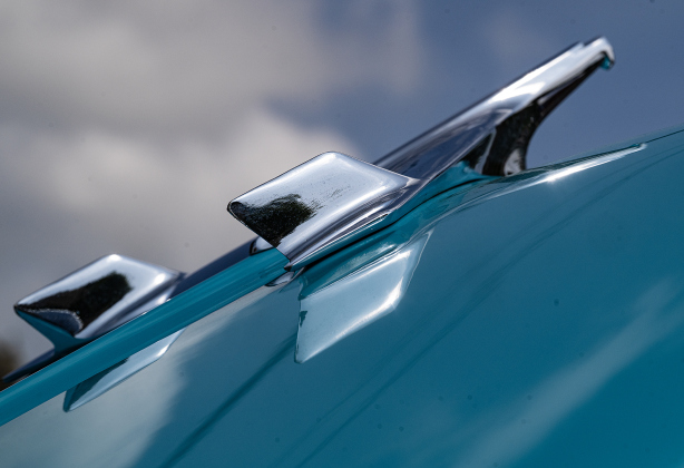 The shiny hood ornament of a 1956 Chevrolet Bel-Air owned by Janie and Corky Lien is seen during  Red Poppy Festival  car show  on Saturday, April 25, 2026.   Photo by  Andy Sharp.