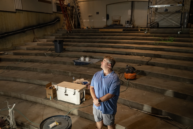 Ron Watson, Executive Artistic Director at the Georgetown Palace, stands in the theatre’s seating area at the historic theater on Tuesday, March 31, 2026.   The theater, which turned 100 years-old in February, sustained severe damage during a winter storm on January 25th.  The theater is closed while restoration work continues.  The goal is to open a performance  of “Jesus Christ Superstar” on the Springer Stage on May 29th.