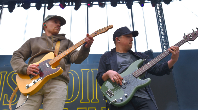 Gary Stanton, left, of Muscadine Bloodline, is joined by bass player Justin Rowton during their Saturday set. The duo, made up of Mr. Stanton and Charlie Muncaster will be on tour around the U.S. through October.