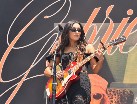 Gabriella Rose started the Sunday performances on the Big River stage with several covers including Miley Cyrus' "Flowers."