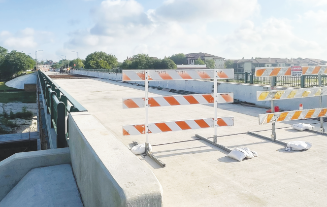 Construction on the Austin Avenue bridge has been paused since this winter, when issues with the work were discovered. (Sun Archive)