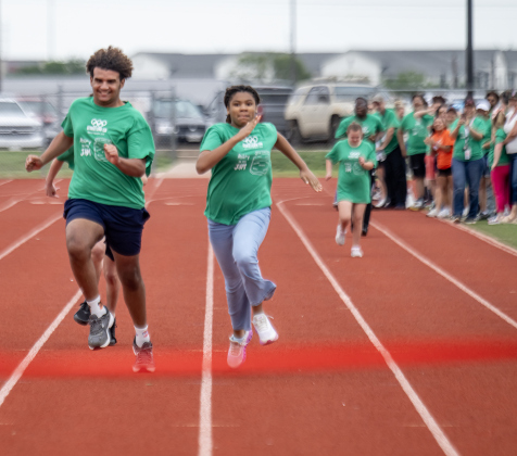 East View High student Juanlys Tejeda, left, and Forbes Middle School student Karmen Ellis, right, race to the finish during a 100-meter track event during the Georgetown ISD Special Olympics on Tuesday, May 5, 2026.