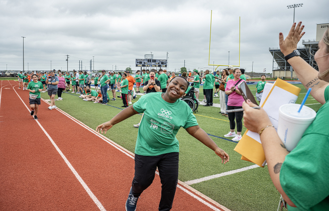 Carver Elementary School student Chizi Ekwenugo celebrates as he completes a 100-meter race during the Georgetown ISD Special Olympics on Tuesday, May 5, 2026.