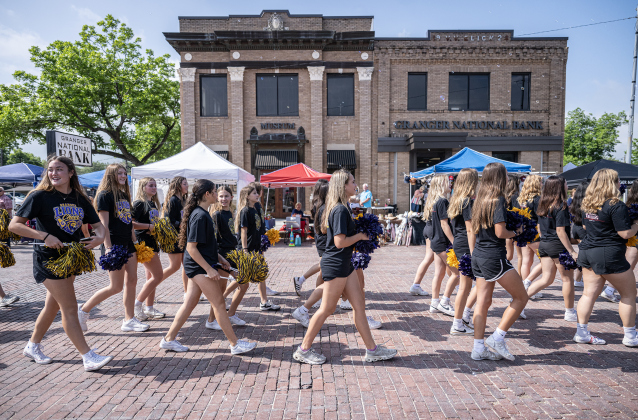 Granger ISD cheerleaders participate in the parade along West Davilla Street during the 47th Annual Granger Lakefest on Saturday, May 9, 2026.   Photo by Andy Sharp.