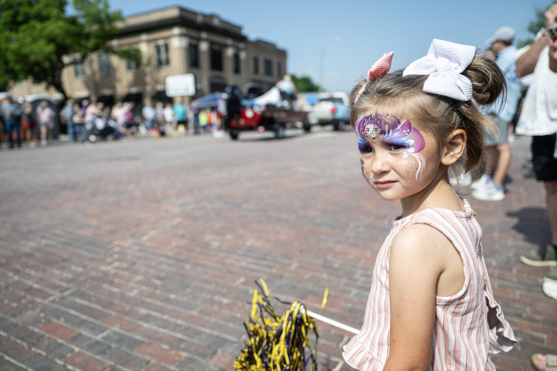 4-year-old Emilia Pustejovsky watched the parade along West Davilla Street during the 47th Annual Granger Lakefest on Saturday, May 9, 2026.   Photo by Andy Sharp.
