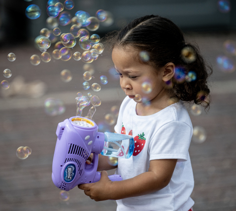 Reverie Adams, who will be 2 this summer, had fun with her bubble toy during the 47th Annual Granger Lakefest on Saturday, May 9, 2026.   Photo by Andy Sharp.