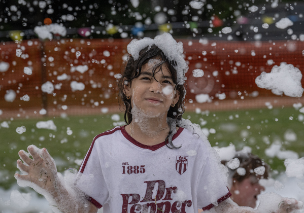Caroline Hidalgo, 9, enjoyed her time playing at Foam Party during the 47th Annual Lakefest in downtown Granger on Friday, May 8, 2026.    Photo by Andy Sharp.