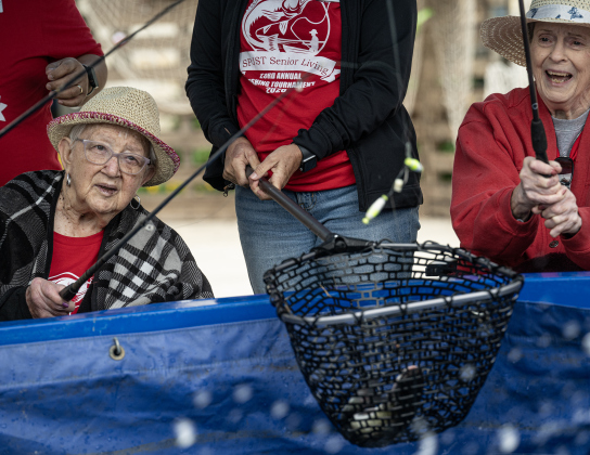 Lois Schmidt, left, and JoAnn Bachmayer, right, had a good time catching fish  during the 23rd Annual SPJST Senior Living Fishing  Tournament on Thursday, May 7, 2026. Senior Living residents fished for 600 pounds of Channel Catfish during the two-day event which continued on Friday.  Residents and staff were treated to a fish fry to celebrate the event.  The fish were provided by Larry’s Fish Farm in Giddings.   Photo by Andy Sharp.
