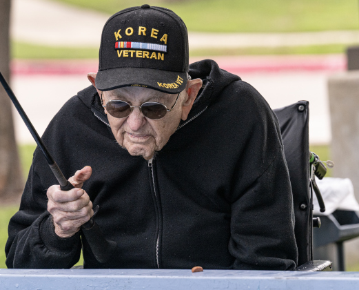Calvin Ging keeps a close watch on his fishing line  during the 23rd Annual SPJST Senior Living Fishing  Tournament on Thursday, May 7, 2026. Senior Living residents fished for 600 pounds of Channel Catfish during the two-day event which continued on Friday.  Residents and staff were treated to a fish fry to celebrate the event.  The fish were provided by Larry’s Fish Farm in Giddings.   Photo by Andy Sharp.