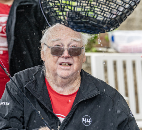 Calvin Heine admires one of the fish he caught  during the 23rd Annual SPJST Senior Living Fishing  Tournament on Thursday, May 7, 2026. Senior Living residents fished for 600 pounds of Channel Catfish during the two-day event which continued on Friday.  Residents and staff were treated to a fish fry to celebrate the event.  The fish were provided by Larry’s Fish Farm in Giddings.   Photo by Andy Sharp.
