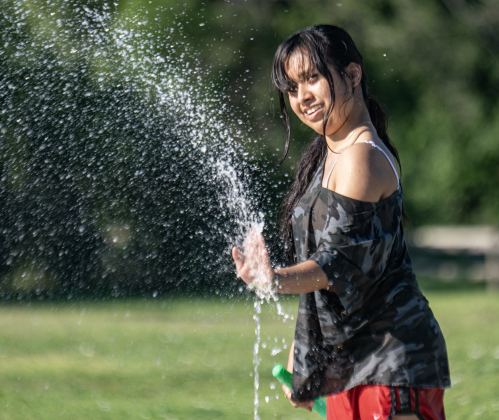 16-year-old Samantha Gomez enjoys the cool water at the San Jose Park splash pad on Wednesday, May 13, 2026.  With temperatures climbing into the 90s this week, families are finding heat relief at area parks and splash pads.     Photo by Andy Sharp.