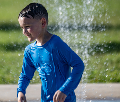 6-year-old Milo Benoic has fun at the San Jose Park splash pad on Wednesday, May 13, 2026.  With temperatures climbing into the 90s this week, families are finding heat relief at area parks and splash pads.     Photo by Andy Sharp.