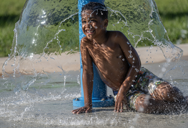 7-year-old Kai Hearns has fun at the San Jose Park splash pad on Wednesday, May 13, 2026.  With temperatures climbing into the 90s this week, families are finding heat relief at area parks and splash pads.     Photo by Andy Sharp.