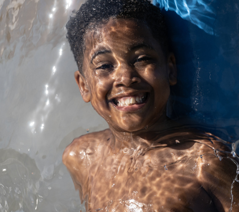 7-year-old Kai Hearns has fun at the San Jose Park splash pad on Wednesday, May 13, 2026.  With temperatures climbing into the 90s this week, families are finding heat relief at area parks and splash pads.     Photo by Andy Sharp.