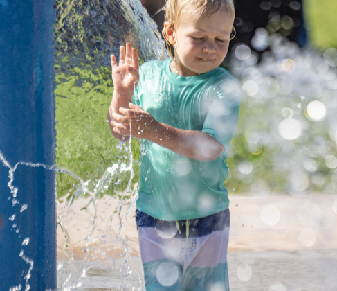 Two-and-a-half year-old Anthony Huthsing enjoys the cool water  at the San Jose Park splash pad on Wednesday, May 13, 2026.  With temperatures climbing into the 90s this week, families are finding heat relief at area parks and splash pads.     Photo by Andy Sharp.