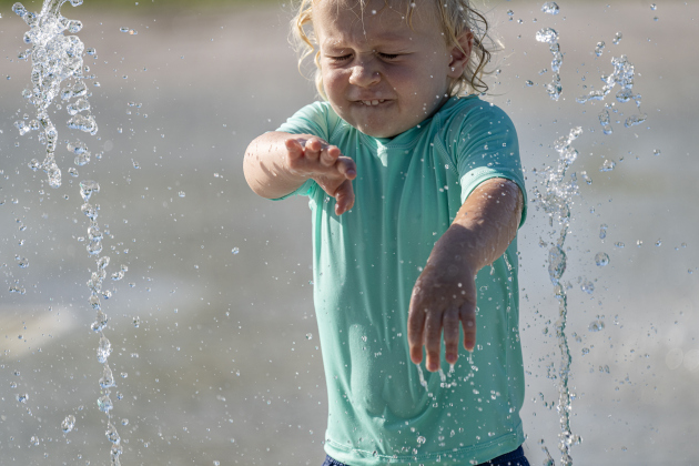 Two-and-a-half year-old Anthony Huthsing has a good time cooling off  at the San Jose Park splash pad on Wednesday, May 13, 2026.  With temperatures climbing into the 90s this week, families are finding heat relief at area parks and splash pads.     Photo by Andy Sharp.