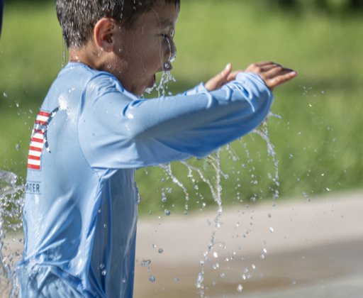 4-year-old Gabriel Gomez finds relief from the heat at the San Jose Park splash pad on Wednesday, May 13, 2026.  With temperatures climbing into the 90s this week, families are finding heat relief at area parks and splash pads.     Photo by Andy Sharp.
