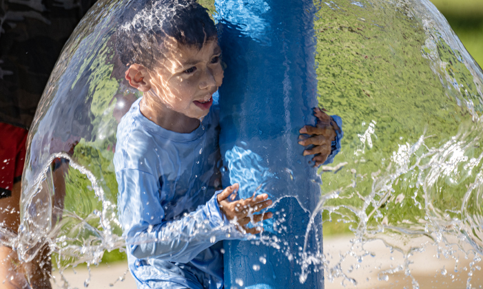 4-year-old Gabriel Gomez enjoys the cool water  at the San Jose Park splash pad on Wednesday, May 13, 2026.  With temperatures climbing into the 90s this week, families are finding heat relief at area parks and splash pads.     Photo by Andy Sharp.