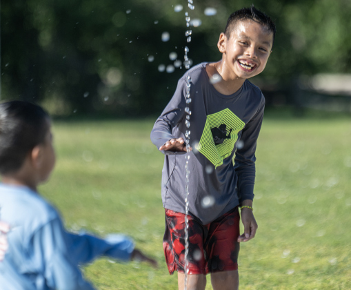 8-year-old Dylan Gomez has fun cooling off at the San Jose Park splash pad on Wednesday, May 13, 2026.  With temperatures climbing into the 90s this week, families are finding heat relief at area parks and splash pads.     Photo by Andy Sharp.