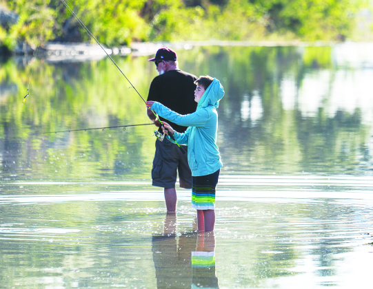 Rob Nixon and his son Aidan, 13, enjoyed fishing together at Blue Hole Park on Saturday, September 27, 2025.  Photo by  Andy Sharp
