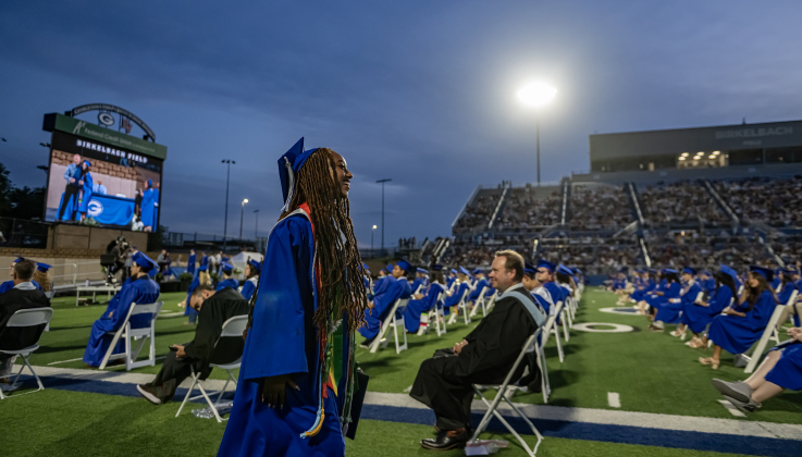 Batise Harvey returns to her seat after receiving her diploma during the 2026 Georgetown High School commencement, held Friday, May 22, 2026 at Birkelbach Stadium.  484 students received their diplomas on this evening.     Photo by Andy Sharp.