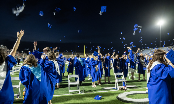 Mortarboards are tossed into the air after all diplomas have been handed out during the 2026 Georgetown High School commencement, held Friday, May 22, 2026 at Birkelbach Stadium.