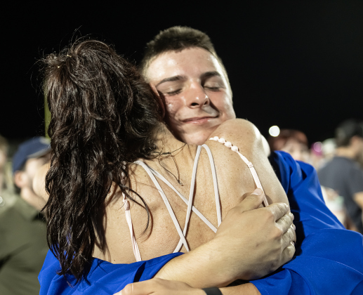 Sandra Murawski embraces her son Caden Ayres-Murawski at the conclusion  the 2026 Georgetown High School commencement, held Friday, May 22, 2026 at Birkelbach Stadium.  484 students received their diplomas on this evening.     Photo by Andy Sharp.